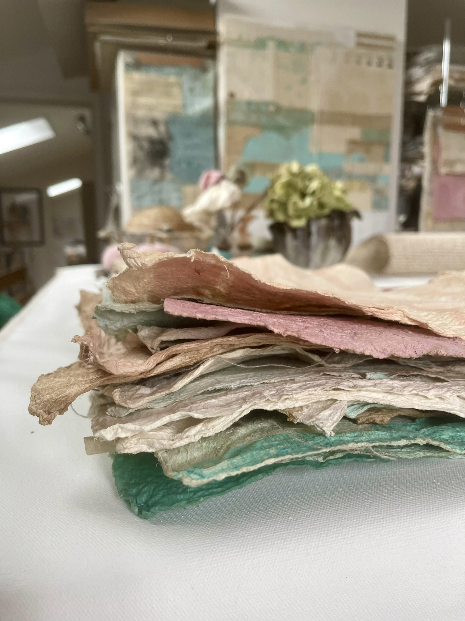 Close up of textured Joomchi paper showing organic fibers and artistic layering